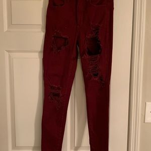 Super distressed American Eagle dark red pants